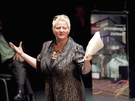 Image of an Artistic Director on theatre stage.