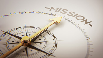 Image showing a compass pointing to the word "Mission"
