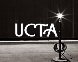 Utah Theatre Association letter logo on a stage with a ghost light